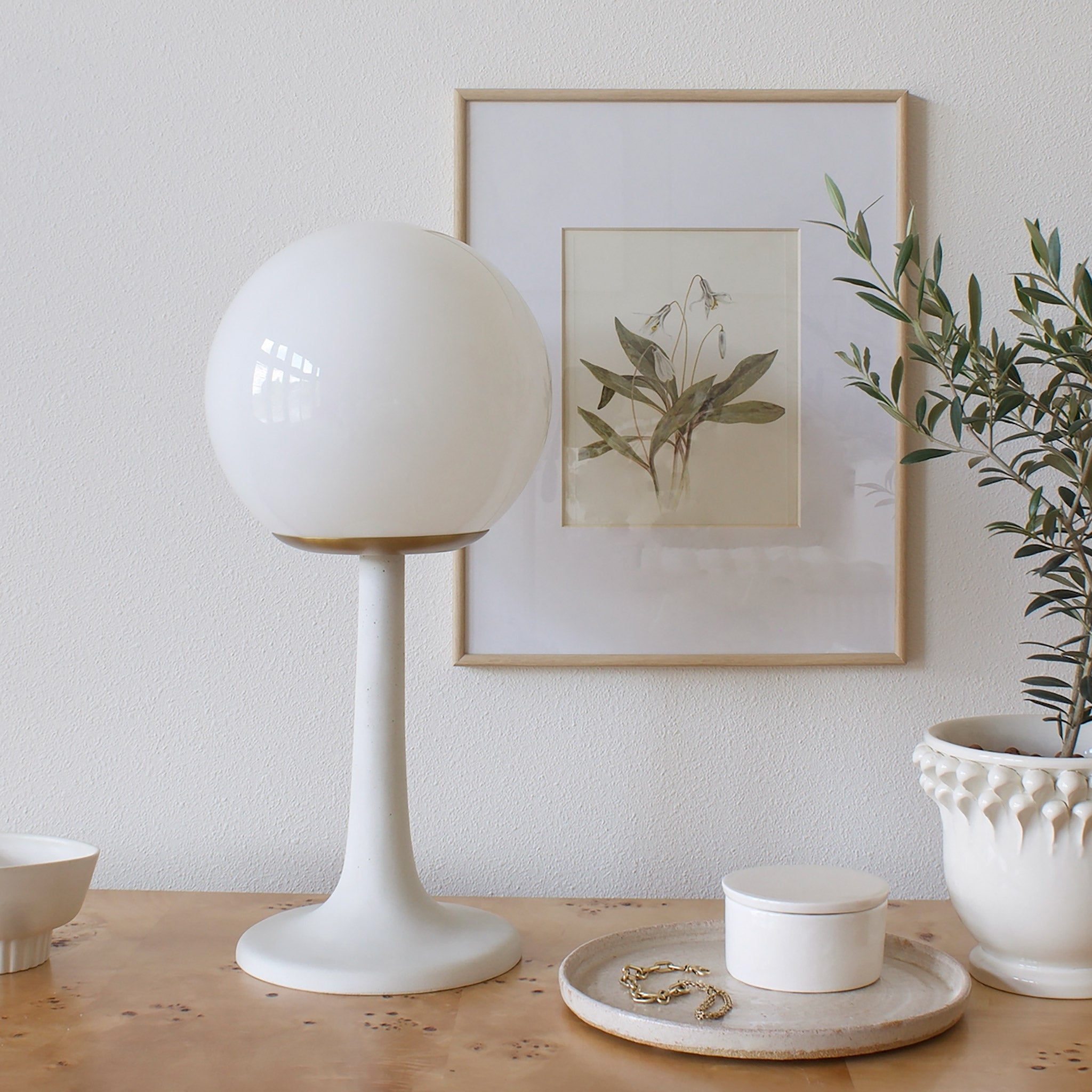 Aaro Lamp shown in Heirloom Brass