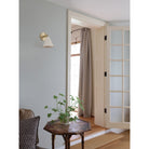 Petra Ceramic Sconce shown in Brass