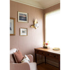 Florence sconce shown in Heirloom Brass.  Interior design by Sarah J. Meyer Design