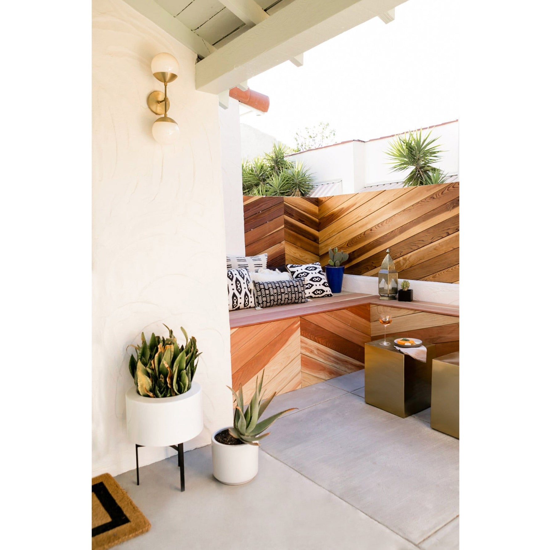 Theo shown in Brass with Opal 6" globes. Interior design by Jaclyn Johnson. Photo by Monica Wang