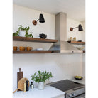 Wildwood shown in Matte Black with an 8" arm length and a Walnut Wood Canopy