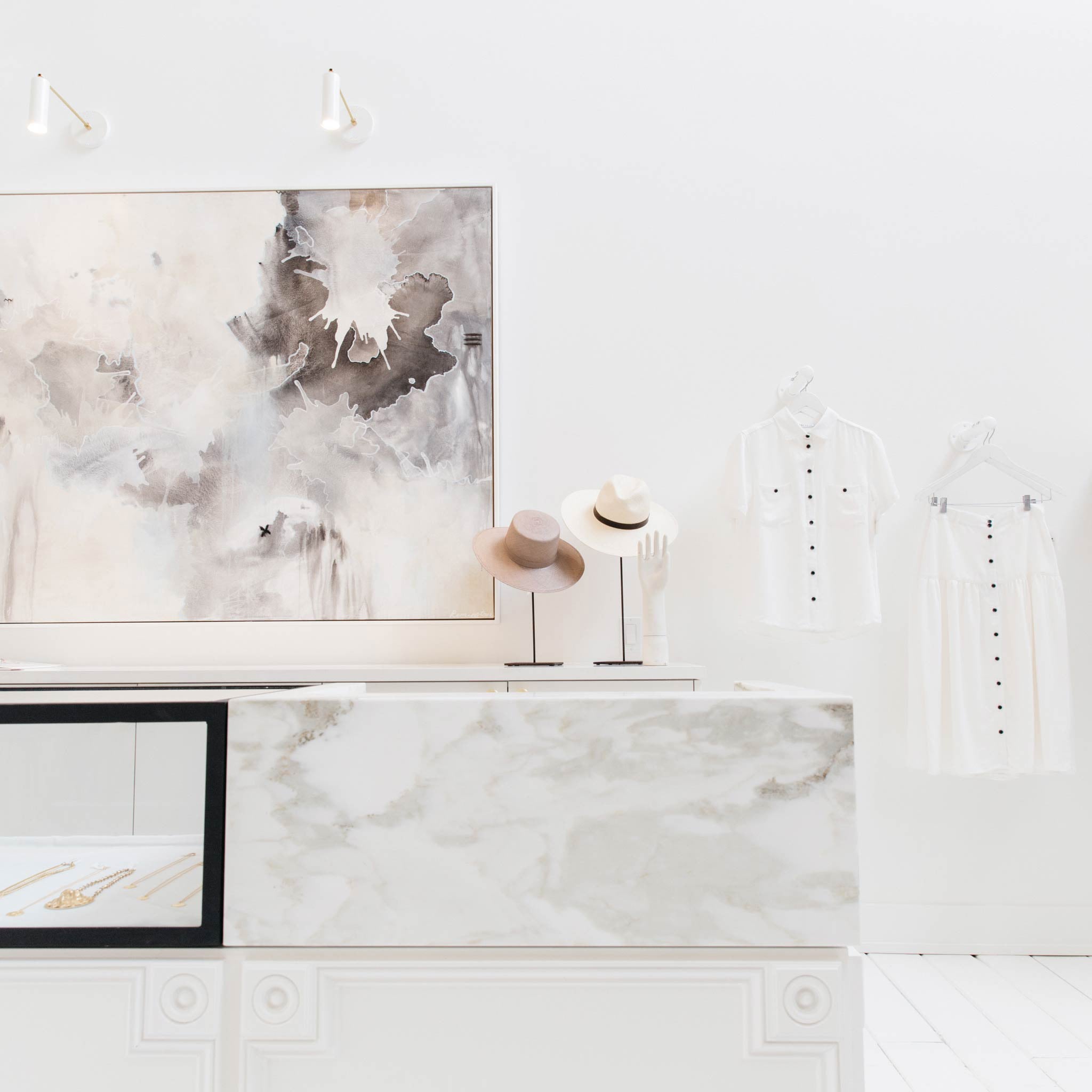 Fjord Spots shown in White with Brass. Interior Design by Alexis Garrett Design. Photo by Madie McKay