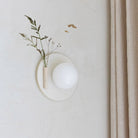 Ikebana Sconce shown in Natural White Glaze with Left mounted vase