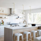 Amélie Double Articulated 8" shown in White with Brass Accents. Interior design by Hazel & Brown. Photo by Janis Nicolay