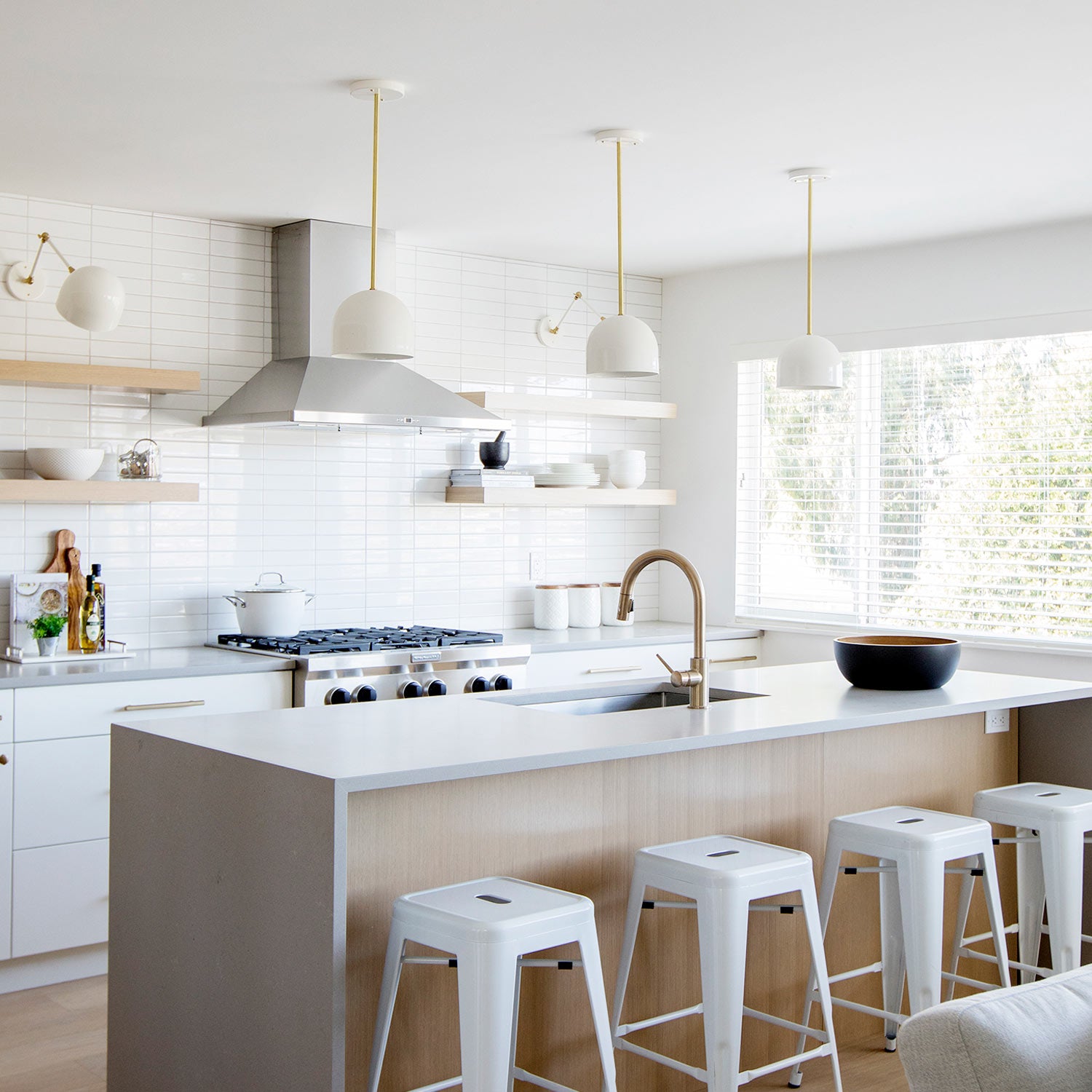 Amélie Double Articulated 8" shown in White with Brass Accents. Interior design by Hazel & Brown. Photo by Janis Nicolay