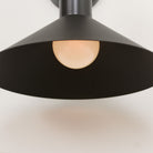 June Sconce shown in Matte Black with Graphite Patina