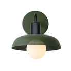 Sally Sconce shown with a Perforated shade in Secret Garden Green and Matte Black fixture finish
