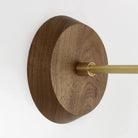 Wood canopy shown in Walnut with Brass arm