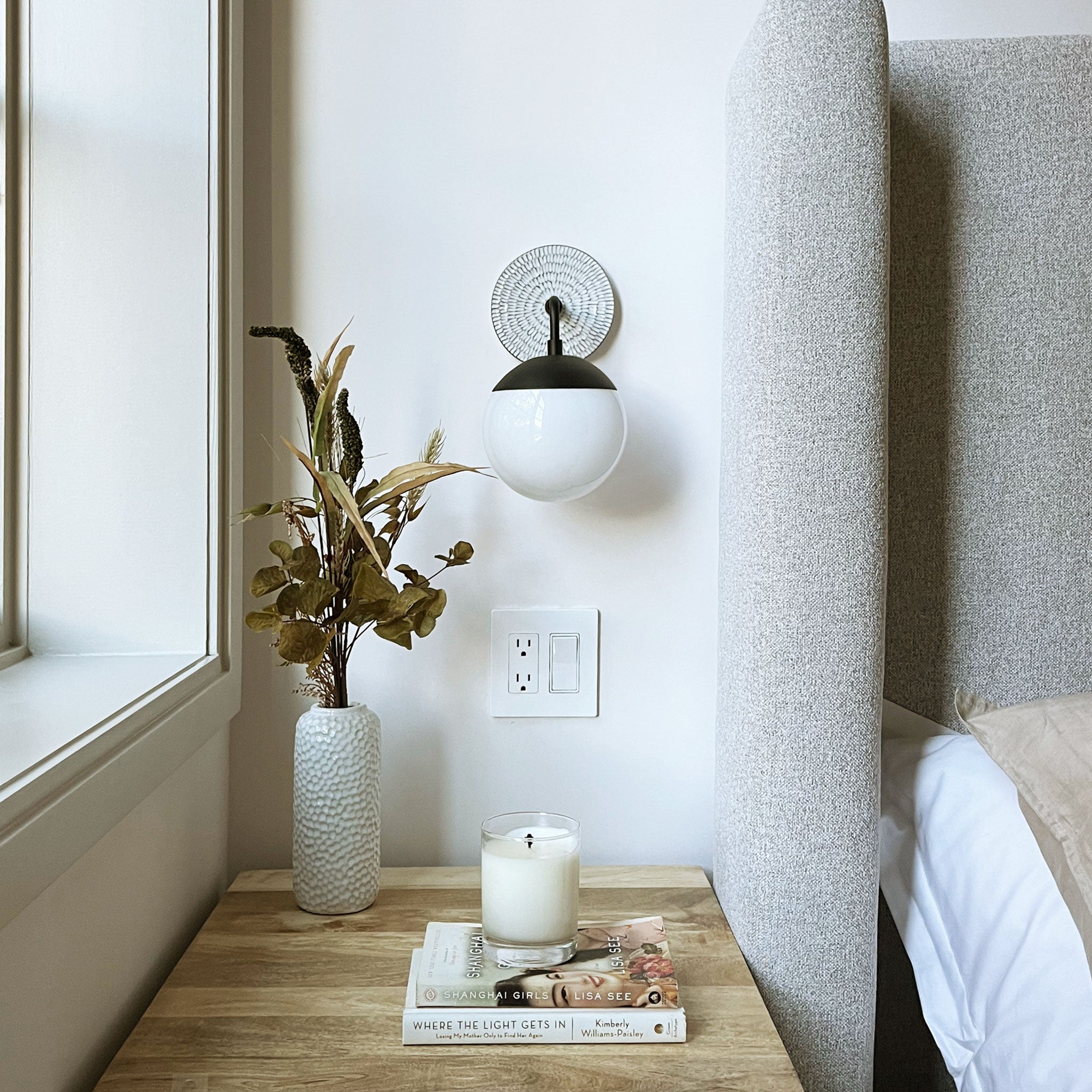 Alto Sconce 6" shown in Matte Black with a Brownstone White Sunflower Ceramic Canopy