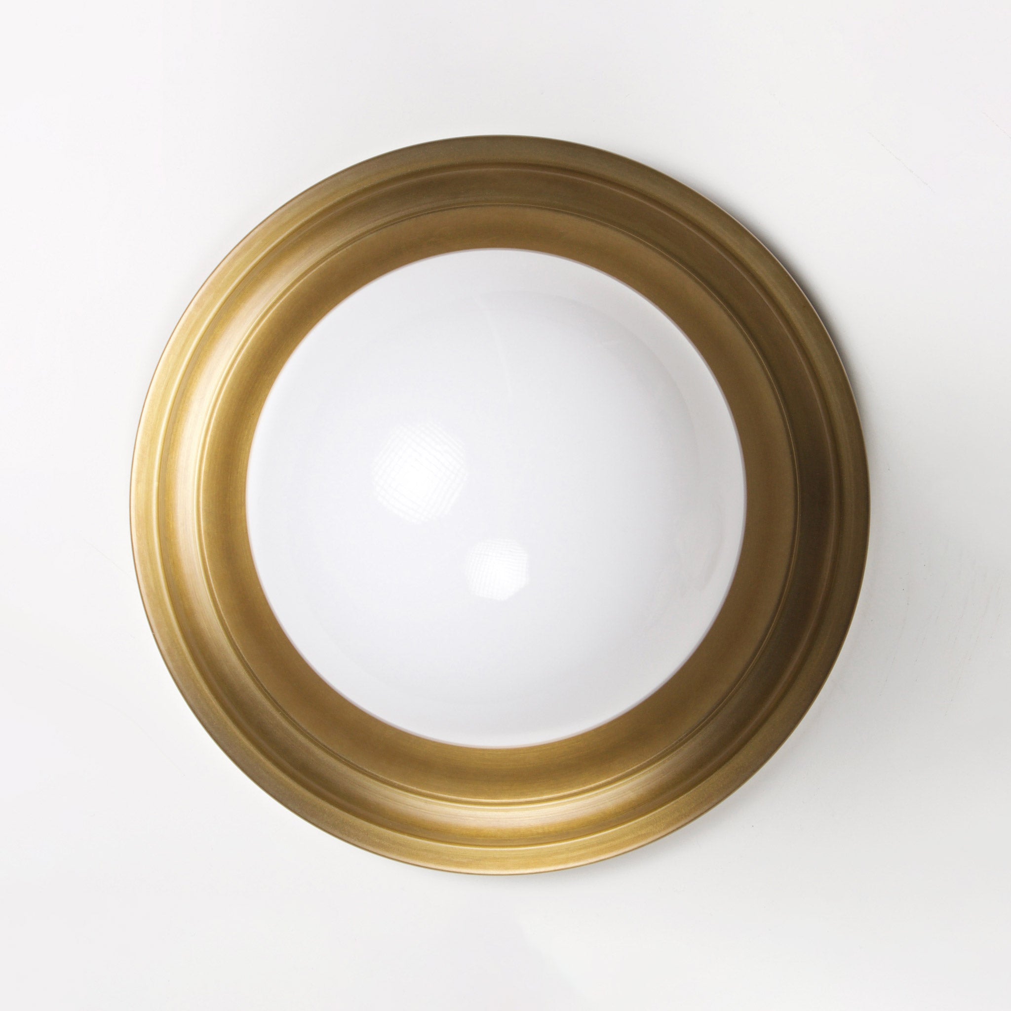 Brigette Sconce shown in Heirloom Brass