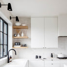 Wildwood with Wood Canopy shown in Matte Black. Interior Design by Rebecca Hepburn. Photo by Janis Nicolay 