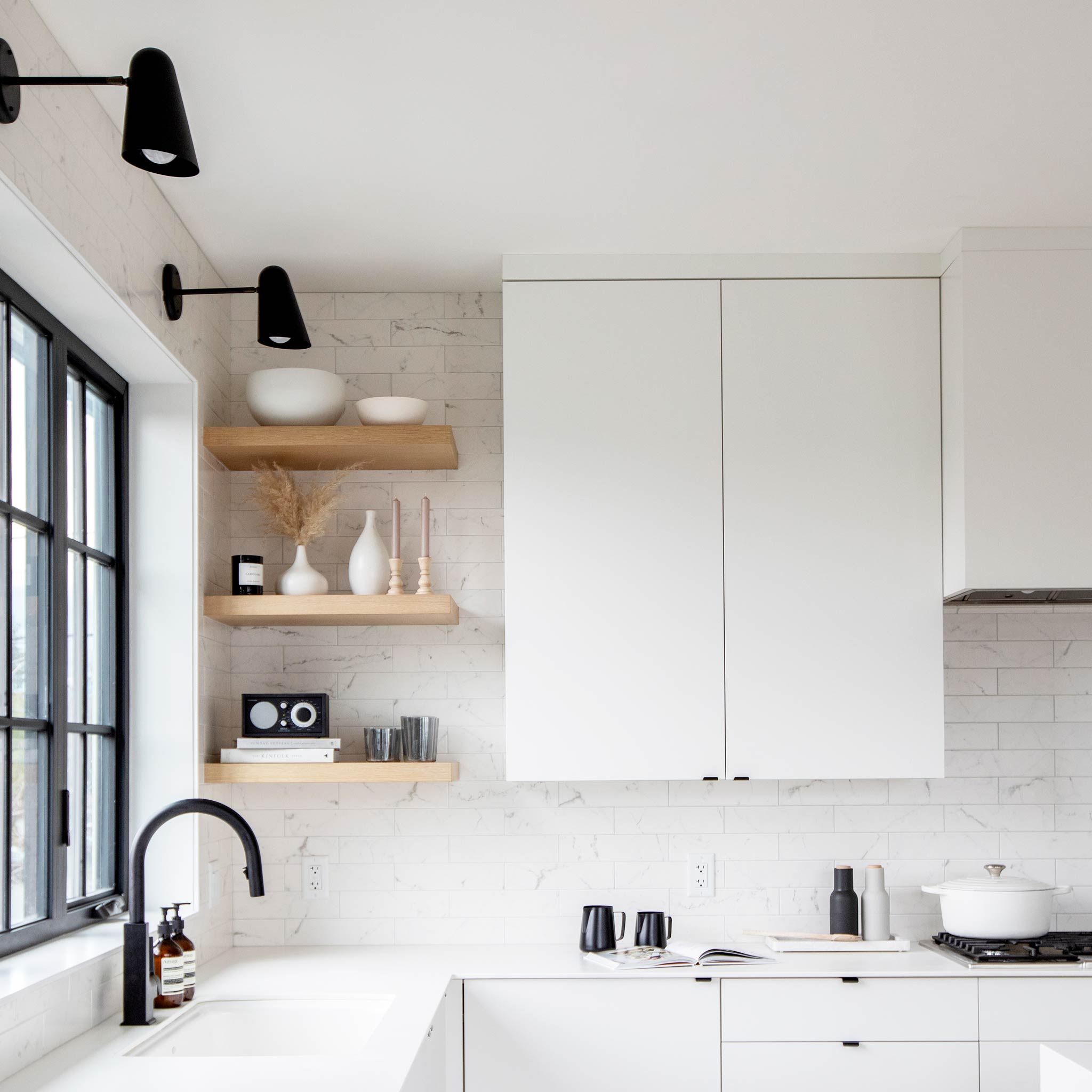 Wildwood with Wood Canopy shown in Matte Black. Interior Design by Rebecca Hepburn. Photo by Janis Nicolay 