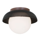 Lexi Large 8” shown with a Perforated shade in Matte Black and Walnut canopy