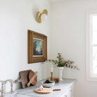 Marie Flush Sconce shown in Brass