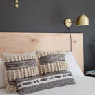 Amélie Sconce 8" shown in Brass with a Black Twisted Cloth Cord. Interior Design by Erin Barrett of Sunwoven. Photo by Margeret Wright.