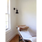 Bobbie Sconce shown in Eclipse Black Glaze with Matte Black Metal and Black Stained Wood finish Canopy