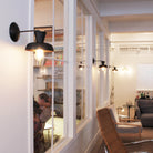 Isle Sconces shown in Matte Black. Interior Design by B Sherman Workshop