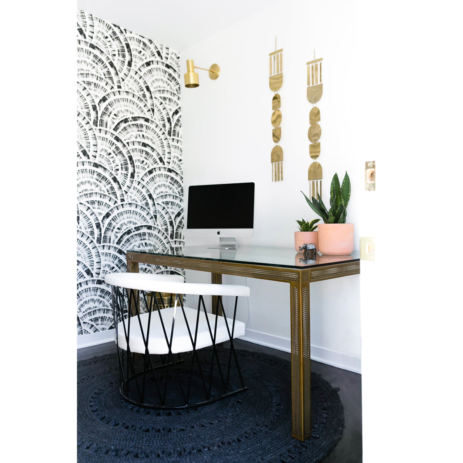 Ridge Sconce shown in Brass. Interior design by Jaclyn Johnson. Photo by Monica Wang