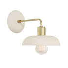 Terra Sconce shown in Bone ceramic finish with Brass metal