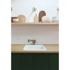 Timberline Surface shown in Brass. Interior Design by Sarah Sherman Samuel for Smitten Studio