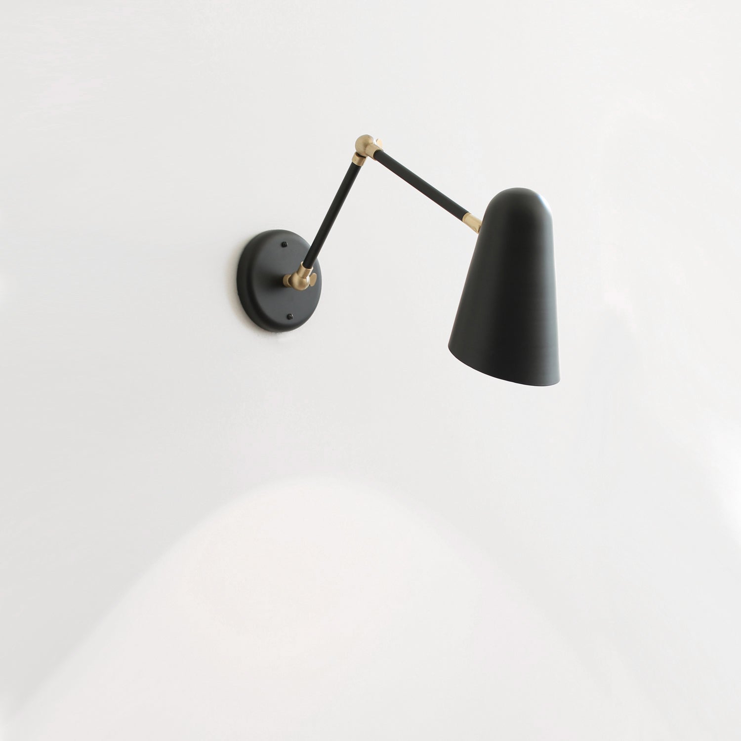 Wildwood Double Articulated in Matte Black with Brass Accents
